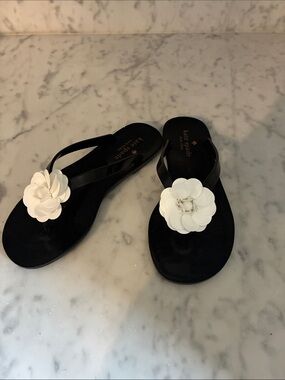 kate spade Black Jelly Toe-Post Sandals with White Floral Appliqués
